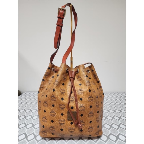 MCM Handbags - Authentic MCM Vintage Heritage Drawstring Bucket Bag Cognac